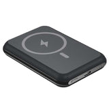 Black wireless charging pad with power symbol on a white background