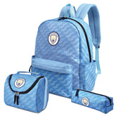 Blue backpack with Manchester City logo, lunch bag, and pencil case on a white background