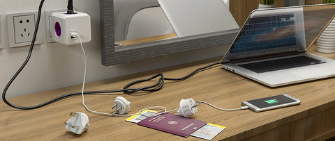 محول السفر PowerCube ReWirable USB – 4 مقابس AC ومنفذا USB مع مجموعة مقابس UK