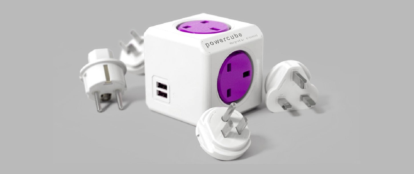 محول السفر PowerCube ReWirable USB – 4 مقابس AC ومنفذا USB مع مجموعة مقابس UK