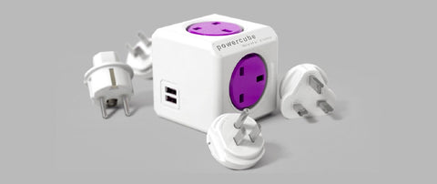 محول السفر PowerCube ReWirable USB – 4 مقابس AC ومنفذا USB مع مجموعة مقابس UK